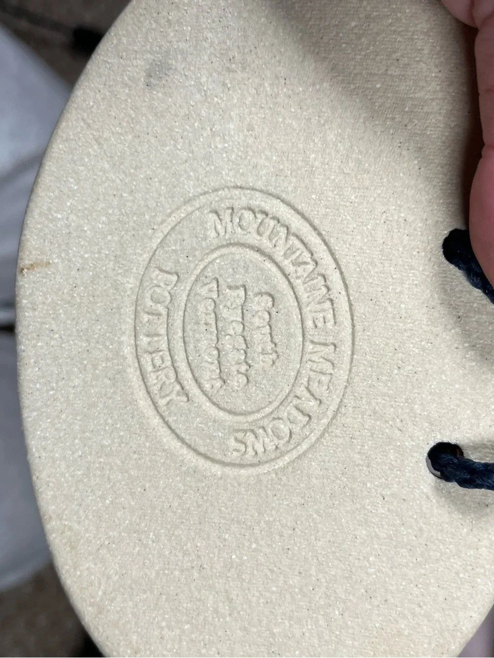 Ceramic Oval Wall Plaques with Blue Text and Leaf Accents stoneware